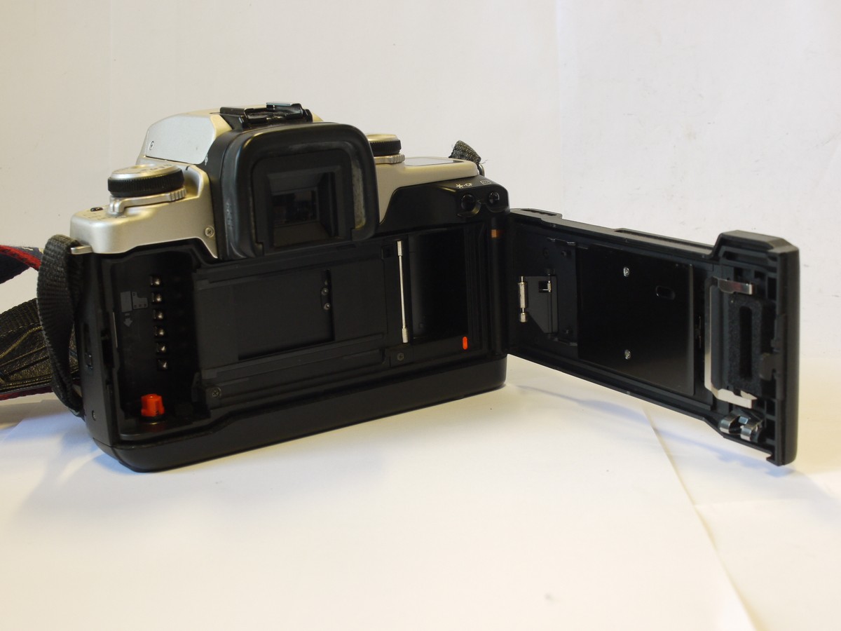 mwclassiccameras-20240216-298 Canon EOS 50E 35mm AF SLR, Black & Grey coloured + Sigma 28-80mm f3.5-5.6 Zoom ens, with front cap, instructions & Canon neck strap