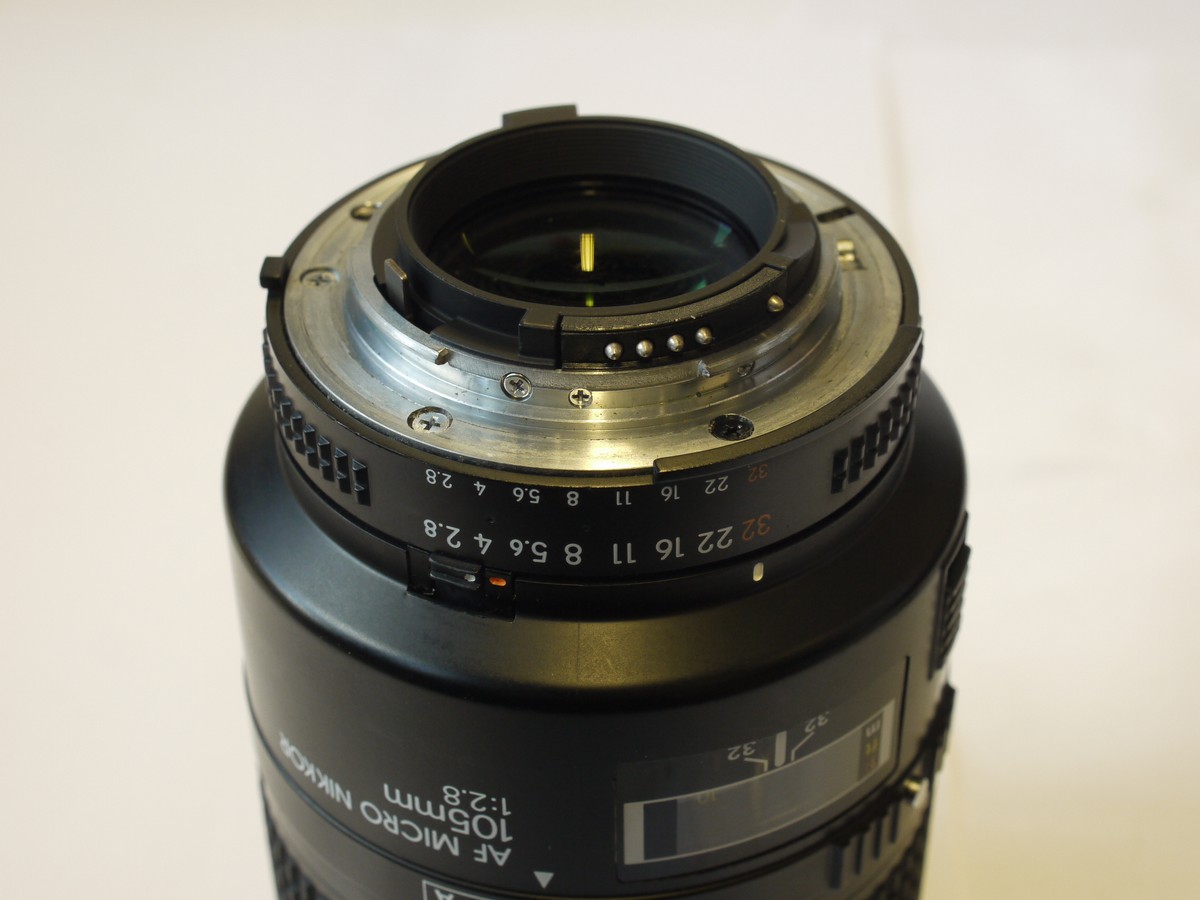 mwclassiccameras-20240216-325 Nikon 105mm f2.8 AF Micro Nikkor auto/manual focus AI-S mount lens + Nikon caps