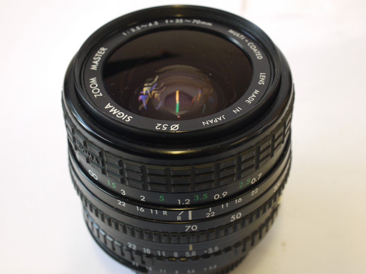 mwclassiccameras-20240216-361 Sigma 35-70mm f3.5-4.5 manual focus AIS mount lens + Niko caps