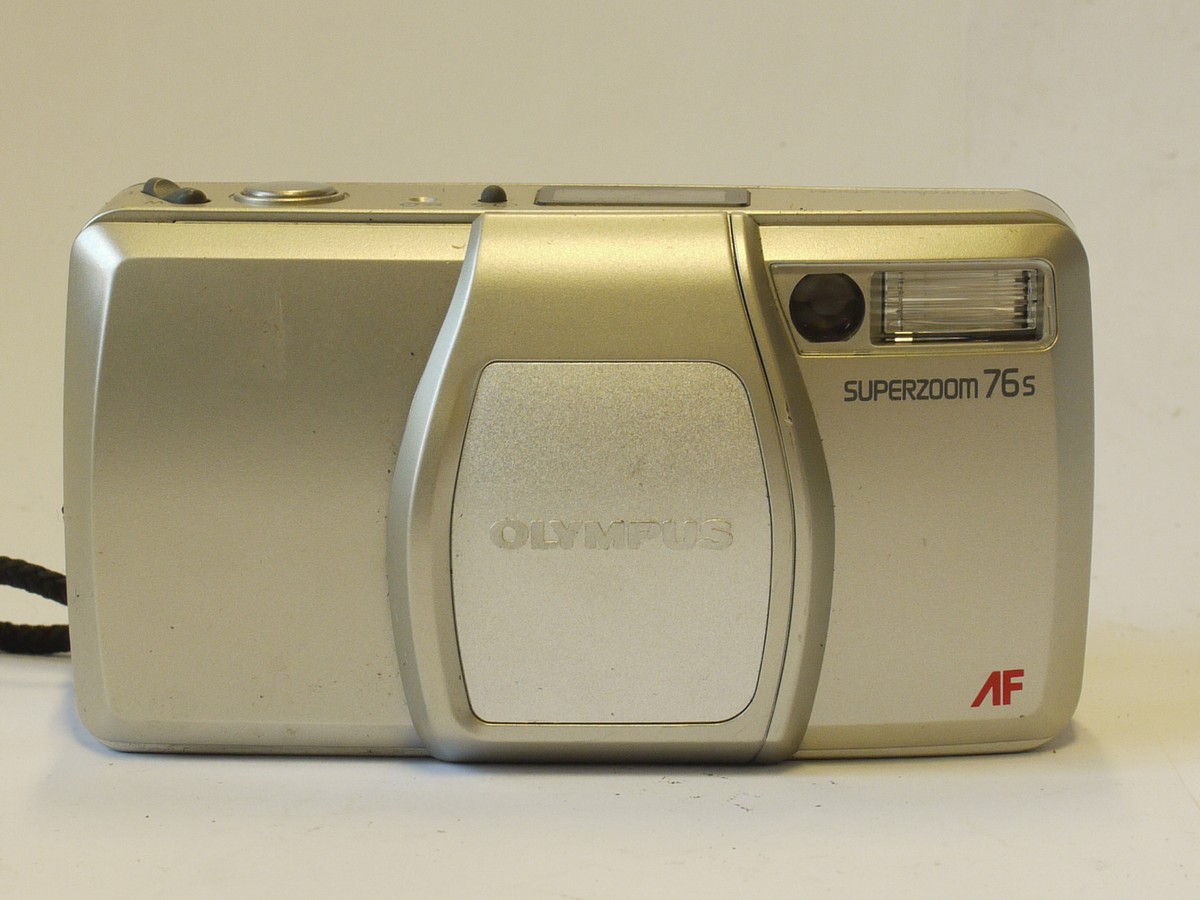 mwclassiccameras-20240216-416 Olympus Superzoom 76s 35mm Autofocus Point-&-Shoot camera, silver coloured, with 38-76mm fZoom, with Wriststrap