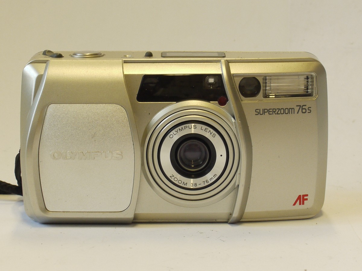 mwclassiccameras-20240216-417 Olympus Superzoom 76s 35mm Autofocus Point-&-Shoot camera, silver coloured, with 38-76mm fZoom, with Wriststrap