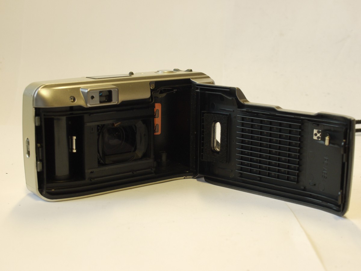 mwclassiccameras-20240216-421 Olympus Superzoom 76s 35mm Autofocus Point-&-Shoot camera, silver coloured, with 38-76mm fZoom, with Wriststrap