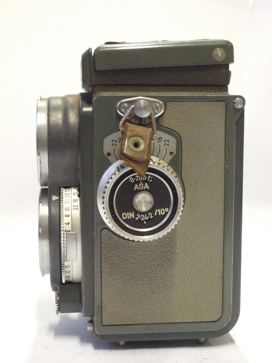 mwclassiccameras-20240223-263 Rollei Baby Grey 4x4 TLR with 60mm f3.5 Xenar lens in Synchro Compur shutter + Rollei Hinging metal front cap for the 6x6 TLR & Grey ER case. NEEDS REPAIR