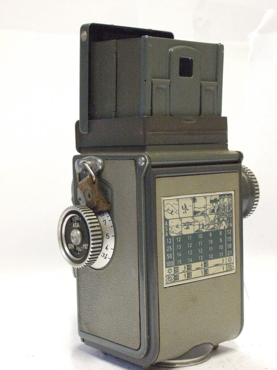 mwclassiccameras-20240223-267 Rollei Baby Grey 4x4 TLR with 60mm f3.5 Xenar lens in Synchro Compur shutter + Rollei Hinging metal front cap for the 6x6 TLR & Grey ER case. NEEDS REPAIR