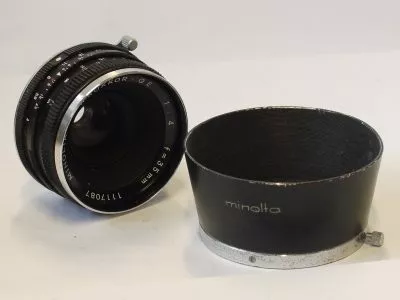 Minolta 35mm f4 W Rokkor-QE  manual focus MX Early lens for Minolta SLRS + Minolta Push-on metal lens hood (D57HB)