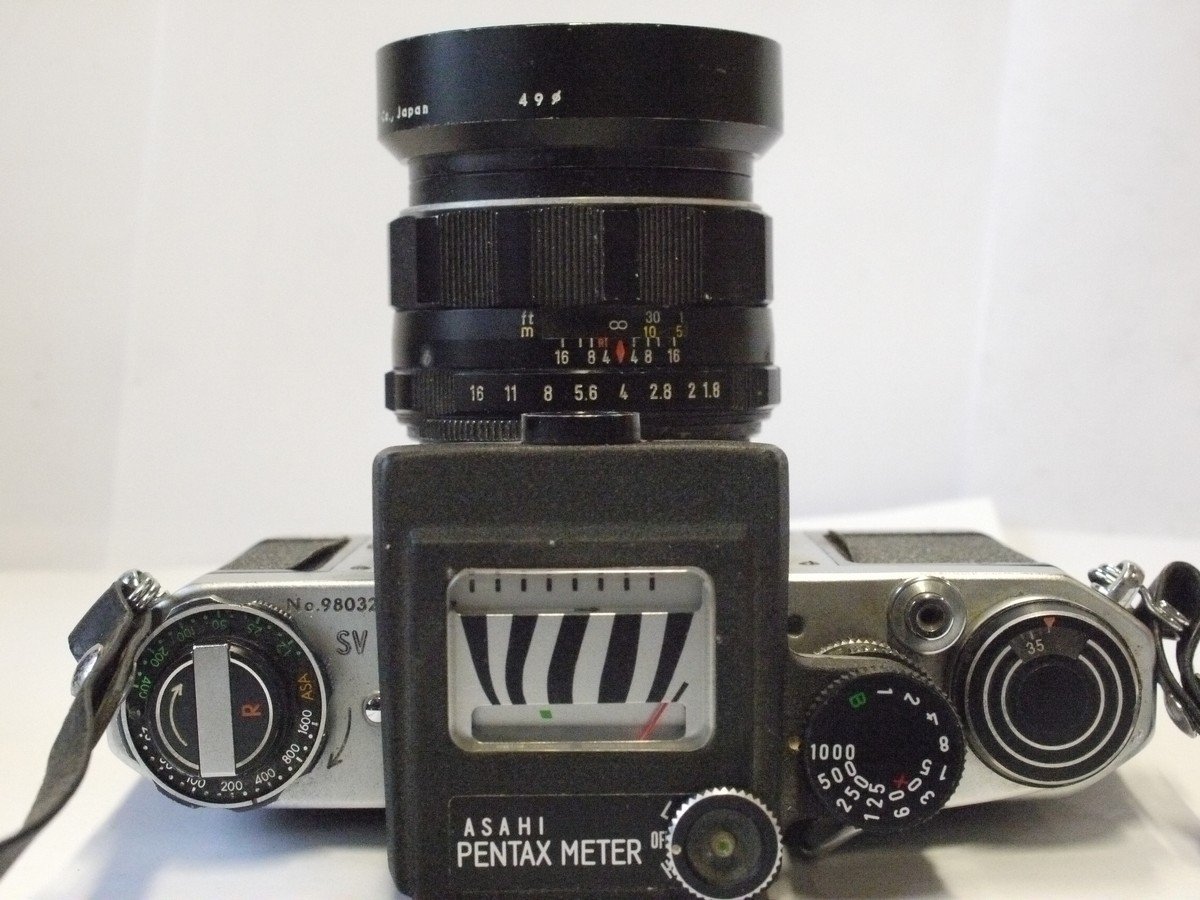 mwclassiccameras-20240229-69 Pentax SV 35mm SLR, chrome, with Pentax shutter coupled Top mounting CDs meter & 55mm f1.8 Super-Takumar M42 lens with Pentax metal lens hood & Strap