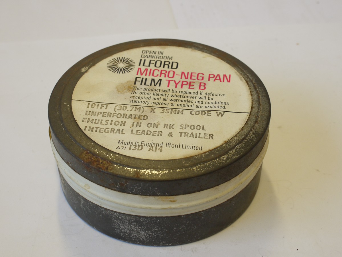 mwclassiccameras-20240308-54 Ilford 100 foot of 35mm Micro-Neg Pan Film Type B, Unperforated, sealed in Tin