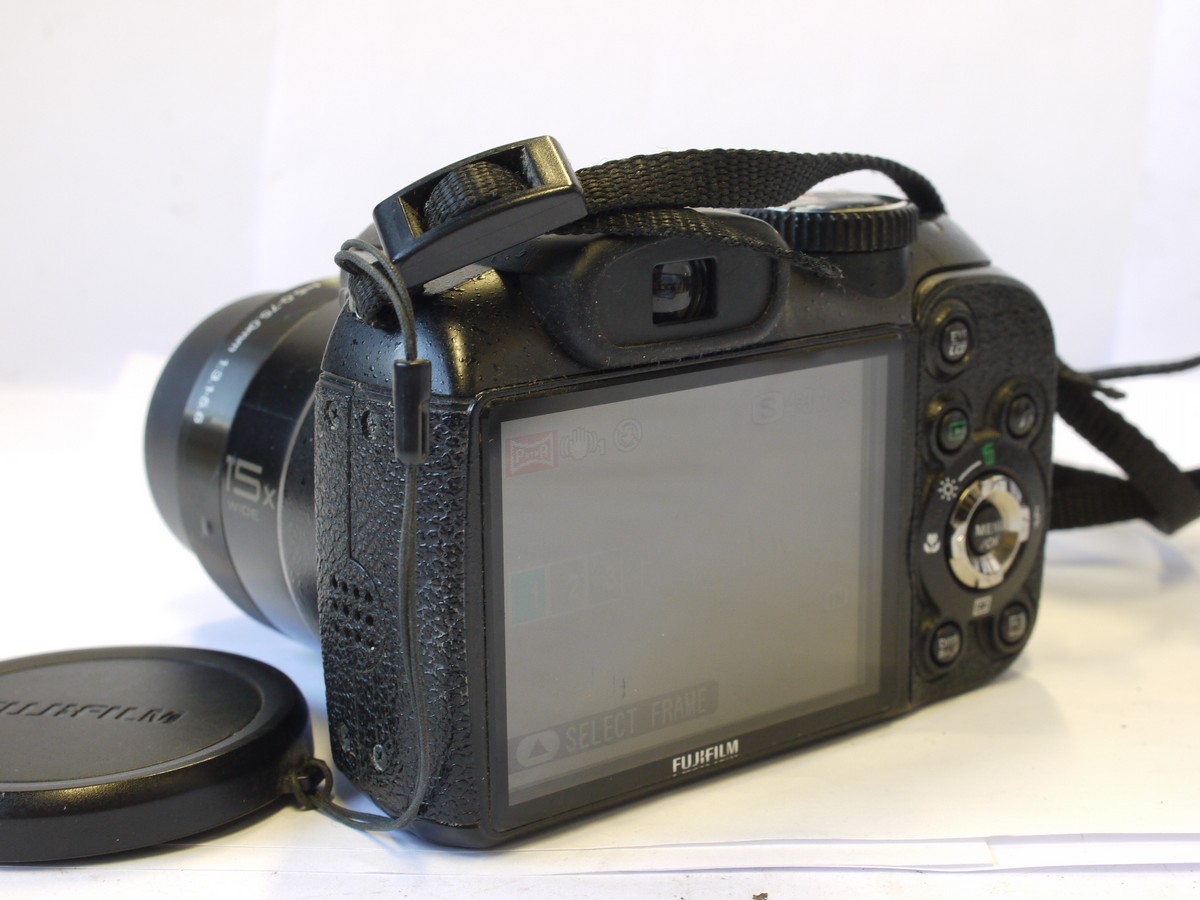 mwclassiccameras-20240308-6 Fujifilm Finepix S1730 Black Digital bridge camera with 5-75mm f3-5.6 Fujibnon 15X Optical zoom lens + front cap & neck strap. Takes AA Batteries