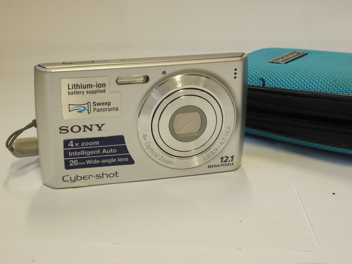 mwclassiccameras-20240315-211 Sony Cybershot DSC-W510 12.1MP digital compact camera, Silver, with 4.7-18.84mm f2.8-5.9 4X Optical Zoom lens + Battery, Wrist Strap & Blue Camera-Bag Case