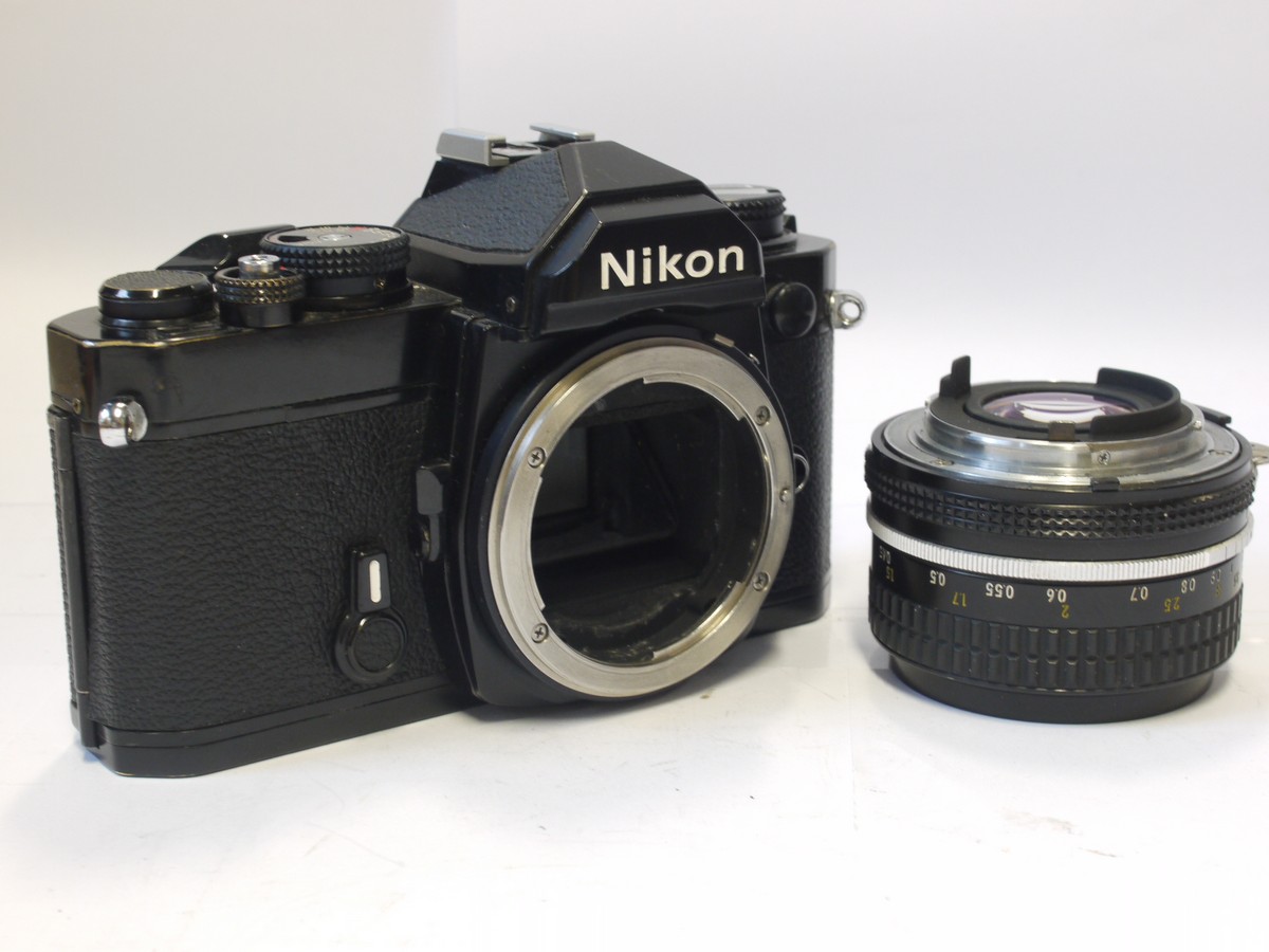 mwclassiccameras-20240322-11 Nikon FM black 35mm SLR + Nikon 50mm f1.8 Nikkor manual focus AI mount lens