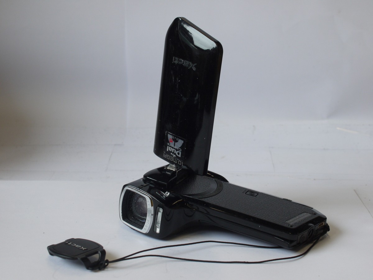 mwclassiccameras-20240329-27 Sanyo Xacti 10MP Video/Still camera with 6.8-35mm f3.5-3.7 5X Zoom lens, with strap, lens cap & Sanyo Battery. No charger. Takes SD Cards