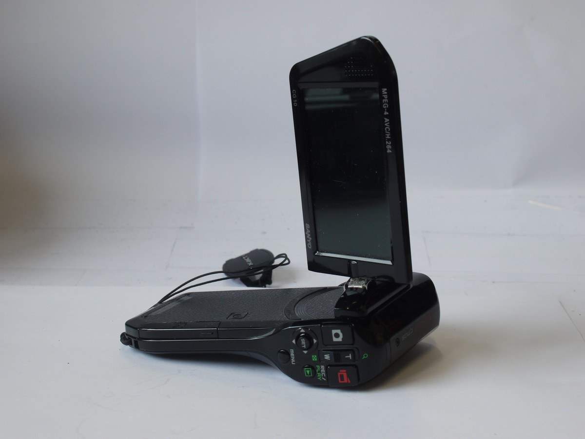 mwclassiccameras-20240329-28 Sanyo Xacti 10MP Video/Still camera with 6.8-35mm f3.5-3.7 5X Zoom lens, with strap, lens cap & Sanyo Battery. No charger. Takes SD Cards