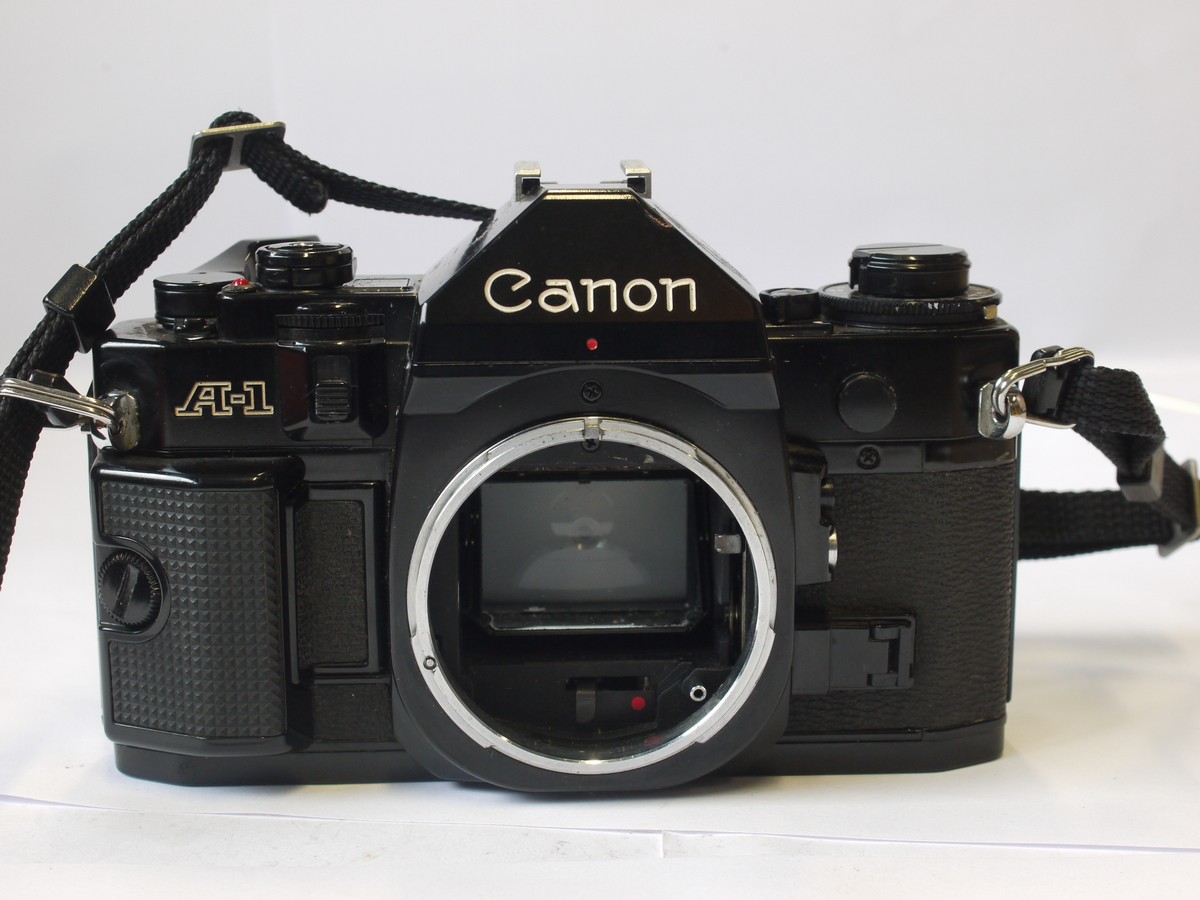 mwclassiccameras-20240405-1 Canon A-1 35mm SLR body, with grip & neck strap