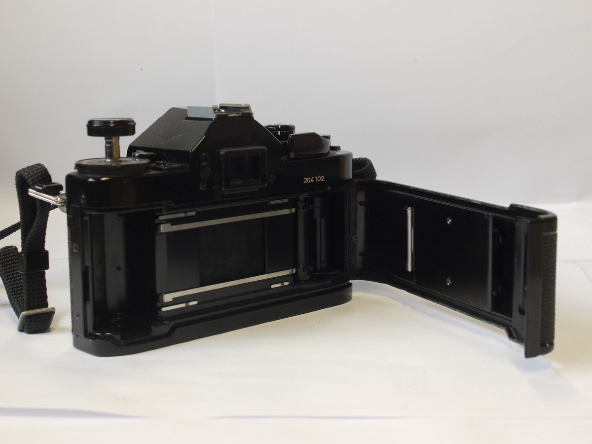 mwclassiccameras-20240405-5 Canon A-1 35mm SLR body, with grip & neck strap