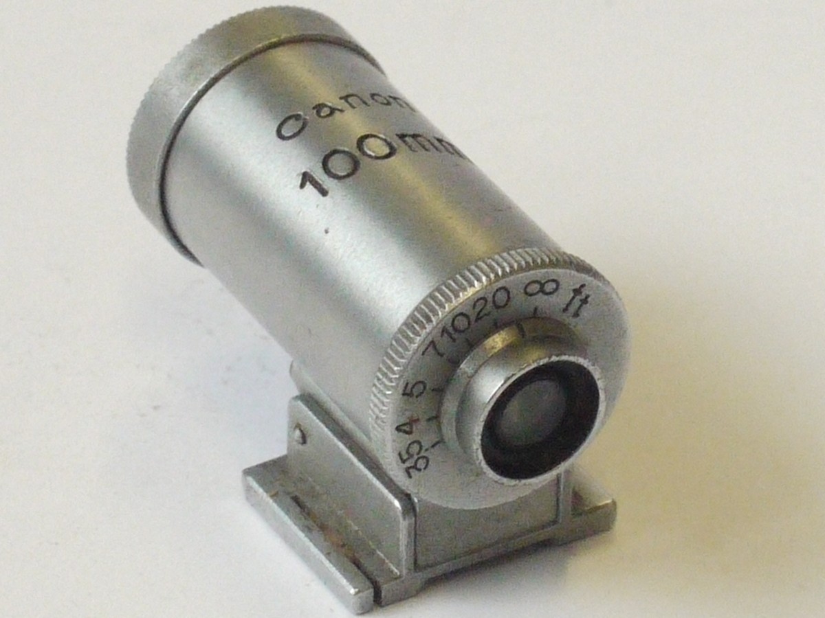 mwclassiccameras-20240426-154 Canon 100mm Optical accessory shoe finder, chrome. Scale in feet