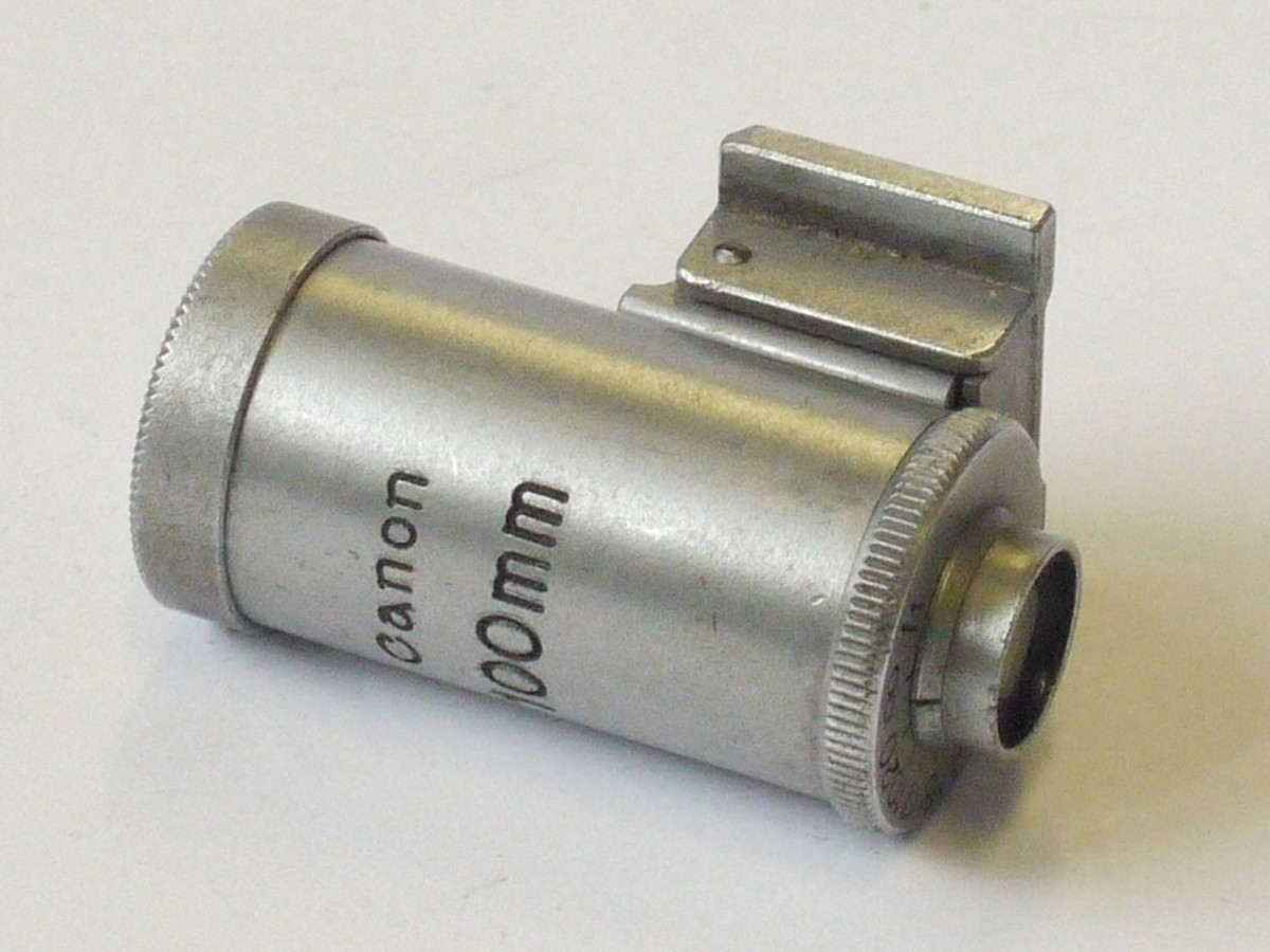 mwclassiccameras-20240426-156 Canon 100mm Optical accessory shoe finder, chrome. Scale in feet