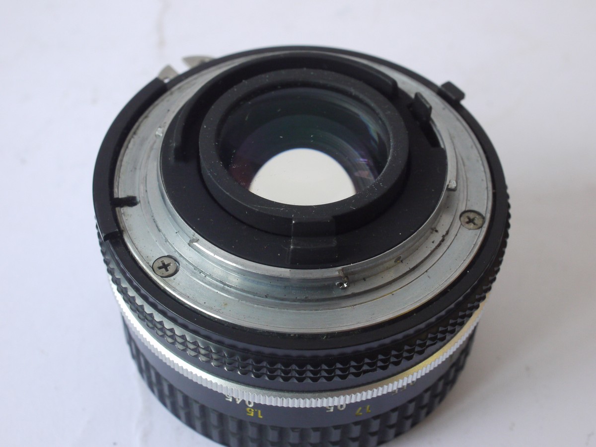 mwclassiccameras-20240524-107 Nikon 50mm f1.8 Nikkor manual focus AI mount lens + Nikon caps & pouch case