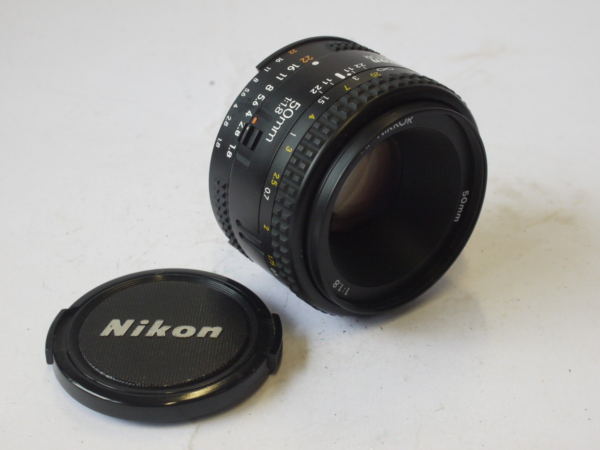 mwclassiccameras-20240524-71 Nikon 50mm f1.8 AF Nikkor AF-S D Type lens + Nikon front cap