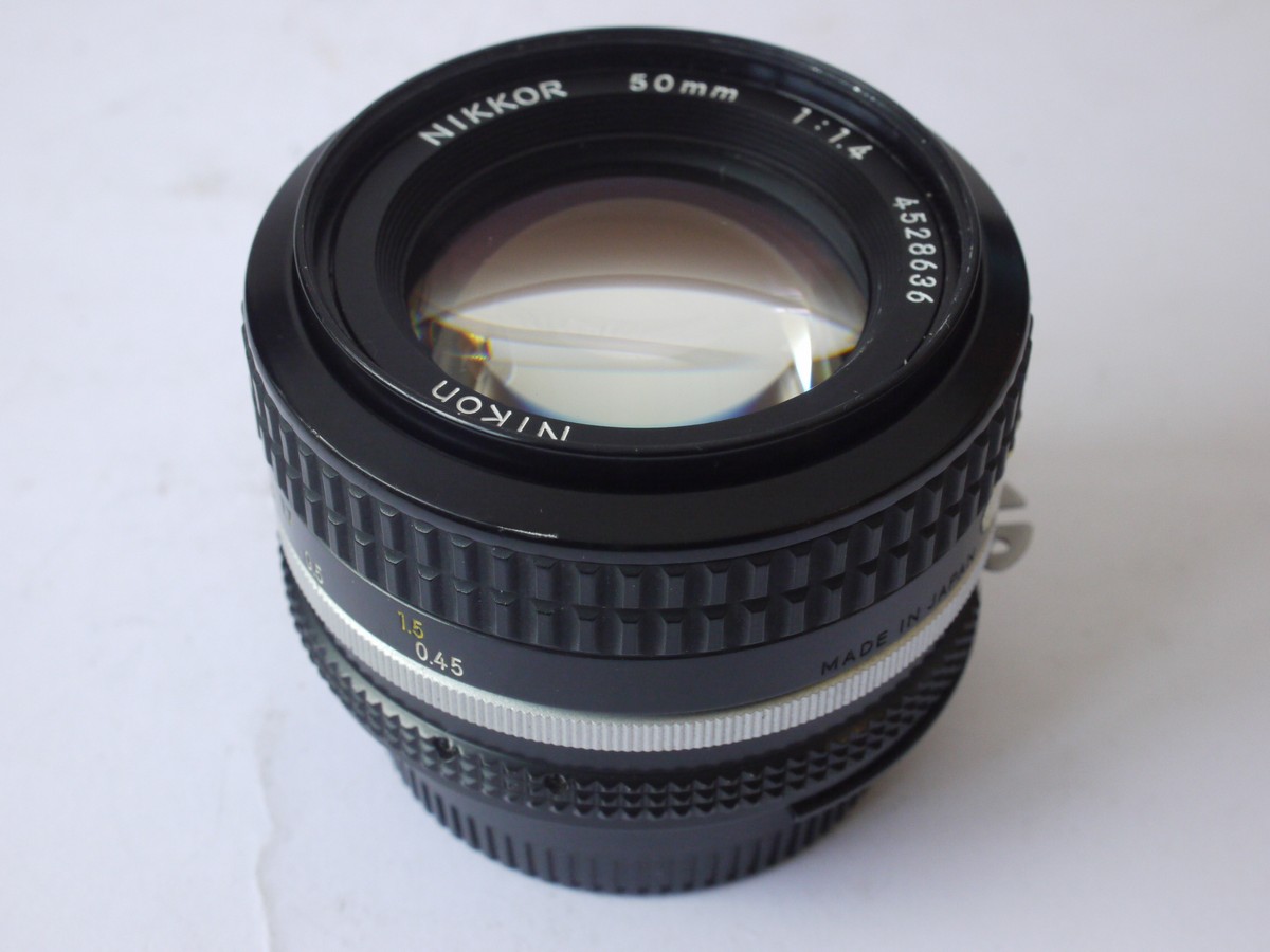 mwclassiccameras-20240524-97 Nikon 50mm f1.4 Nikkor manual focus AI mount lens + Nikon caps