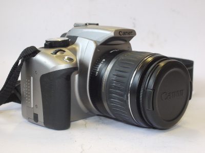 Canon EOS 350D 8MP Digital SLR with APSC Sensor, Silver coloured + Canon EF-S 18-55mm f3.5-5.6 II USM lens + Battery & Canon Strap