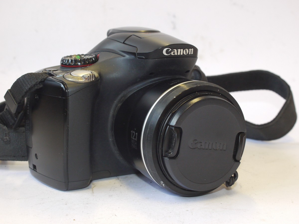 mwclassiccameras-20240531-119 Canon Powershot SX40 HS 12.1MP Digital Bridge Camera with 4.3-150.5mm f2.7-5.8 USM 35x IS lens, with neck strap & Three Batteries. No charger