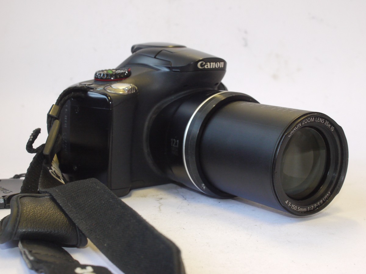 mwclassiccameras-20240531-123 Canon Powershot SX40 HS 12.1MP Digital Bridge Camera with 4.3-150.5mm f2.7-5.8 USM 35x IS lens, with neck strap & Three Batteries. No charger