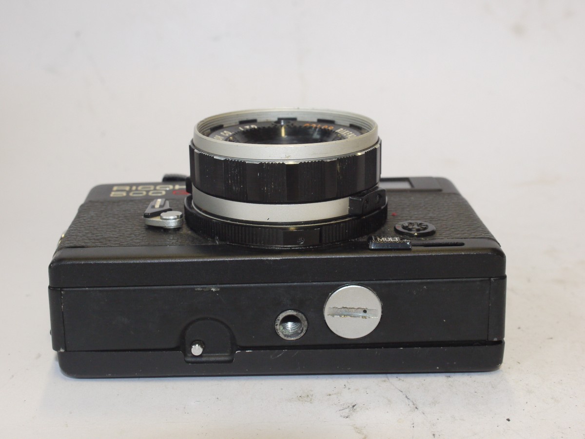 mwclassiccameras-20240531-201 Ricoh 500GX 35mm CDS metered coupled rangefinder camera, black, with 40mm f2.8 Rikenon lens + front cap & case. SUITABLE FOR SPARE PARTS/REPAIR