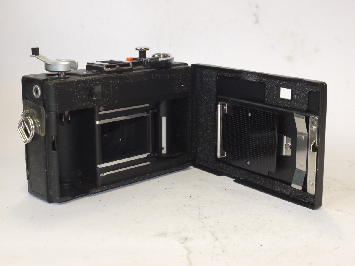 mwclassiccameras-20240531-202 Ricoh 500GX 35mm CDS metered coupled rangefinder camera, black, with 40mm f2.8 Rikenon lens + front cap & case. SUITABLE FOR SPARE PARTS/REPAIR