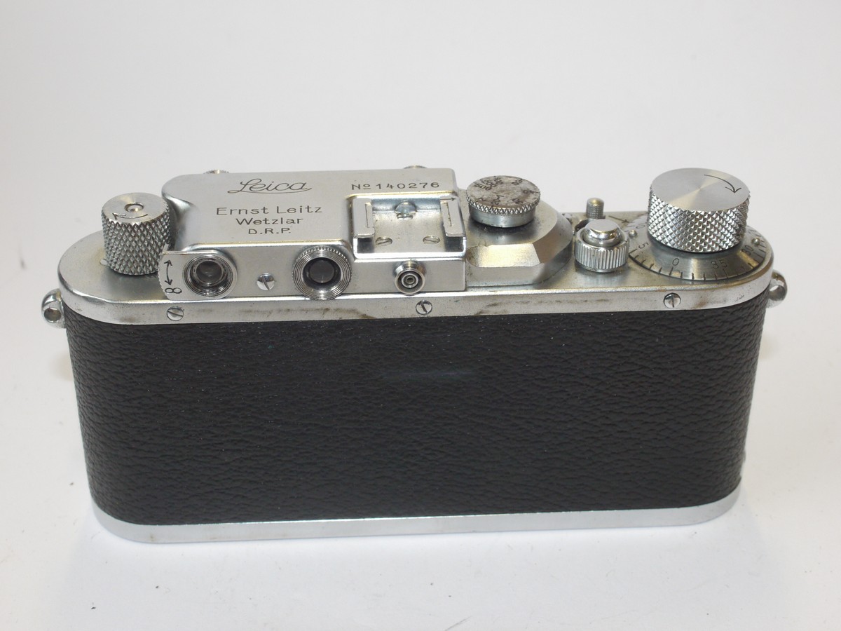 mwclassiccameras-20240607-128 Leica III bright chrome body (No.140276) with Spool. Has added rear top flash synch socket