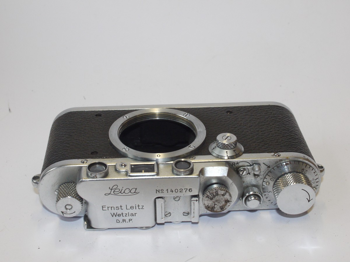 mwclassiccameras-20240607-129 Leica III bright chrome body (No.140276) with Spool. Has added rear top flash synch socket