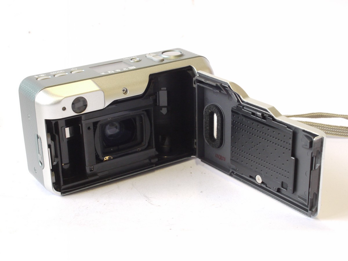 mwclassiccameras-20240712-161 Canon Sureshot 105u 35mm Compact Autofocus Point-&- Shoot camera, Silver coloured, with 38-105mm Zoom, wrist trap, Instructions, Acrylic Photo Frame & makers Box