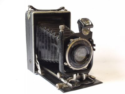 Balda-Werk 9x12cm folding plate camera with glass back/rear hood & 15cm f4.5 Tessar lens in Compur shutter. UNCOMMON BALDA PLATE CAMERA