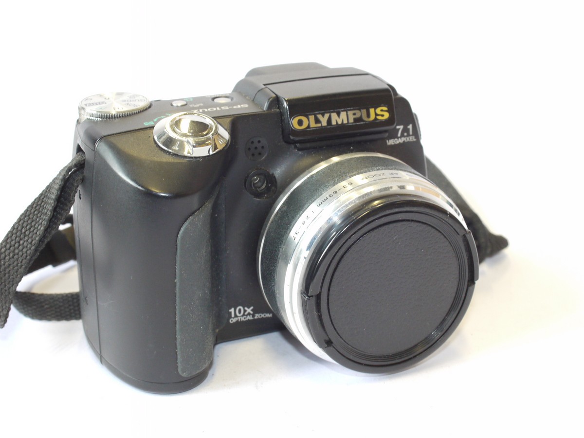 mwclassiccameras-20240712-23 Olympus SP-51OUZ 7.1MP Digital Bridge camera with 6.3-63mm f2.8-3.7 Zoom lens + front cap & strap
