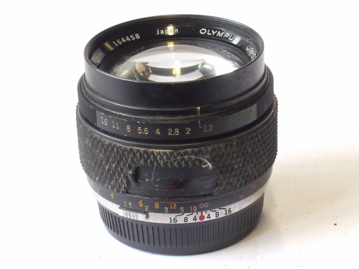 mwclassiccameras-20240712-266 Olympus 55mm f1.2 G Zuiko Auto-S manual focus OM mouynt lens + rear cap. OPTICS NEEDS CLEANING