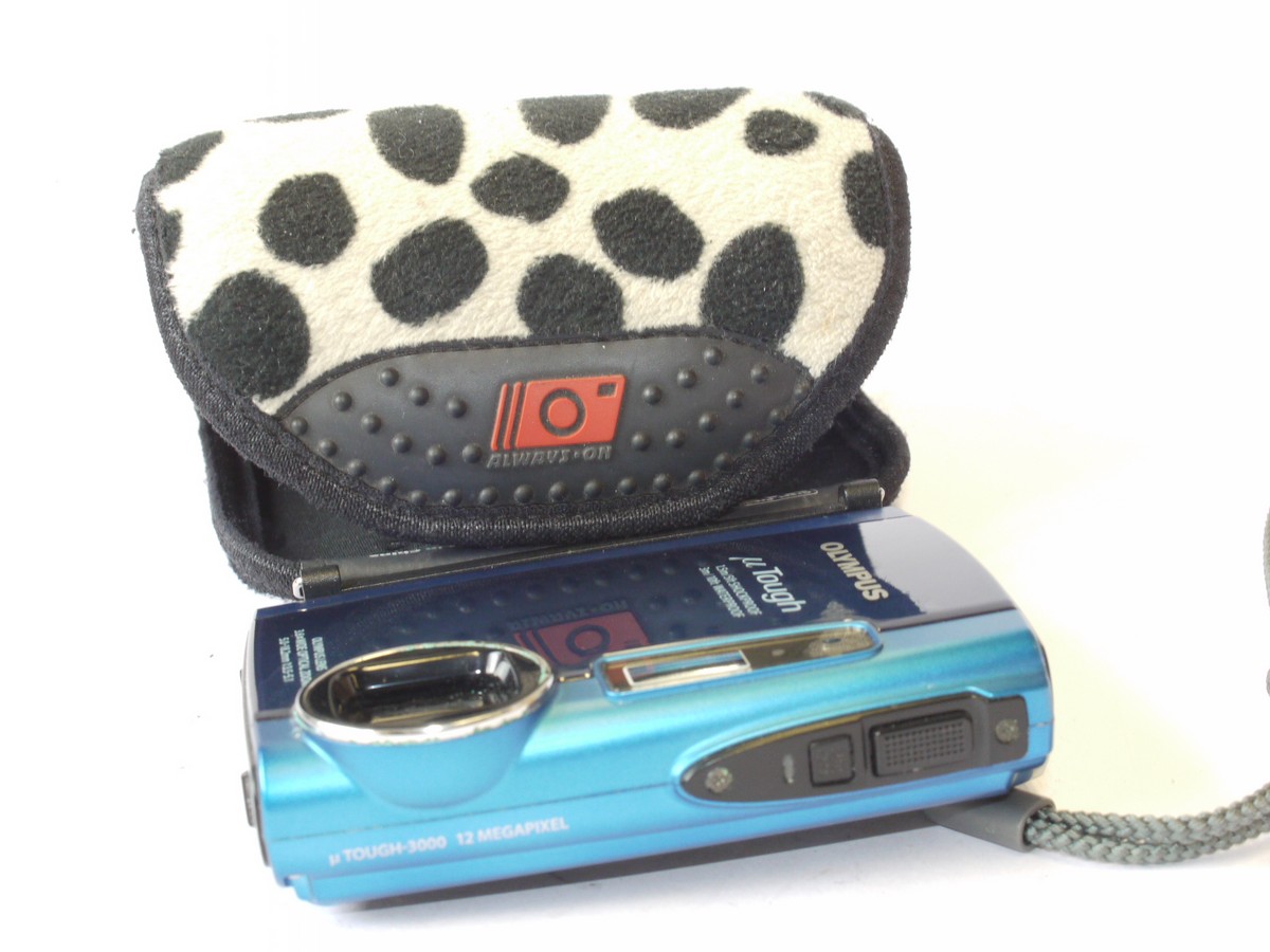 mwclassiccameras-20240712-29 Olympus uTough 3000 12MP BLUE camera, Shockproof & Waterproof, with 5-18.2mm f3.5-5.1 Olympus lens + Battery (NO Charger), Strap & GoAlwaysOn.com wrap-around case