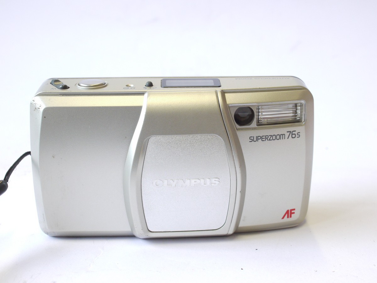 mwclassiccameras-20240719-23 Olympus Superzoom 76s 35mm Compact AF Point-&-Shoot amera, Silver coloured, with 38-76mm Zoom lens + Neck Strap