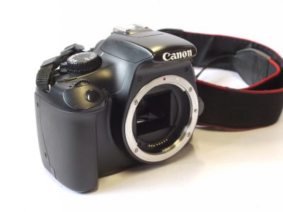 Canon EOS 1100D 12.2MP APS System Digital SLR body with Battery, Mains Unit & Neck Strap (No Charger)