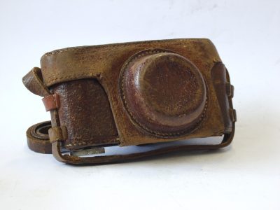 Wallace Heaton Brown leather ER case for the L39 cameras. Small tripod screw size, flat nose front. With strap