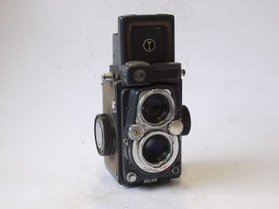 Yashica 44 LM 4x4 in 127 TLR, Grey body with Light Grey covering, with 60mm f3.5 Yashinon lens in Copal-SV shutter + Brown ER case