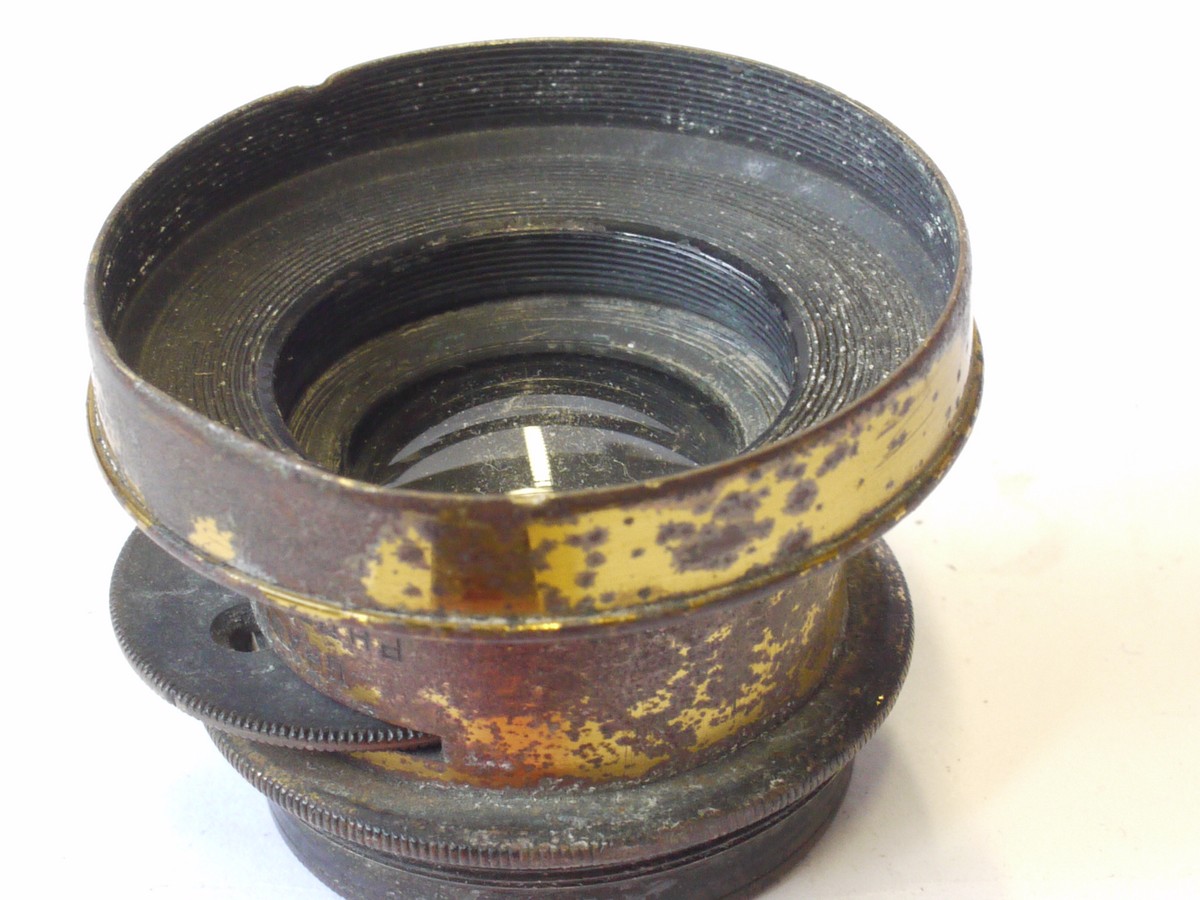 mwclassiccameras-20240816-136 Photo-Port Paris 2-3 inch (Estimated) Grand Angle (Wide Angle) brass lens with rotating wheel apertures & scree-in brass lens hood. Lens engraved 8x12 (Coverage)