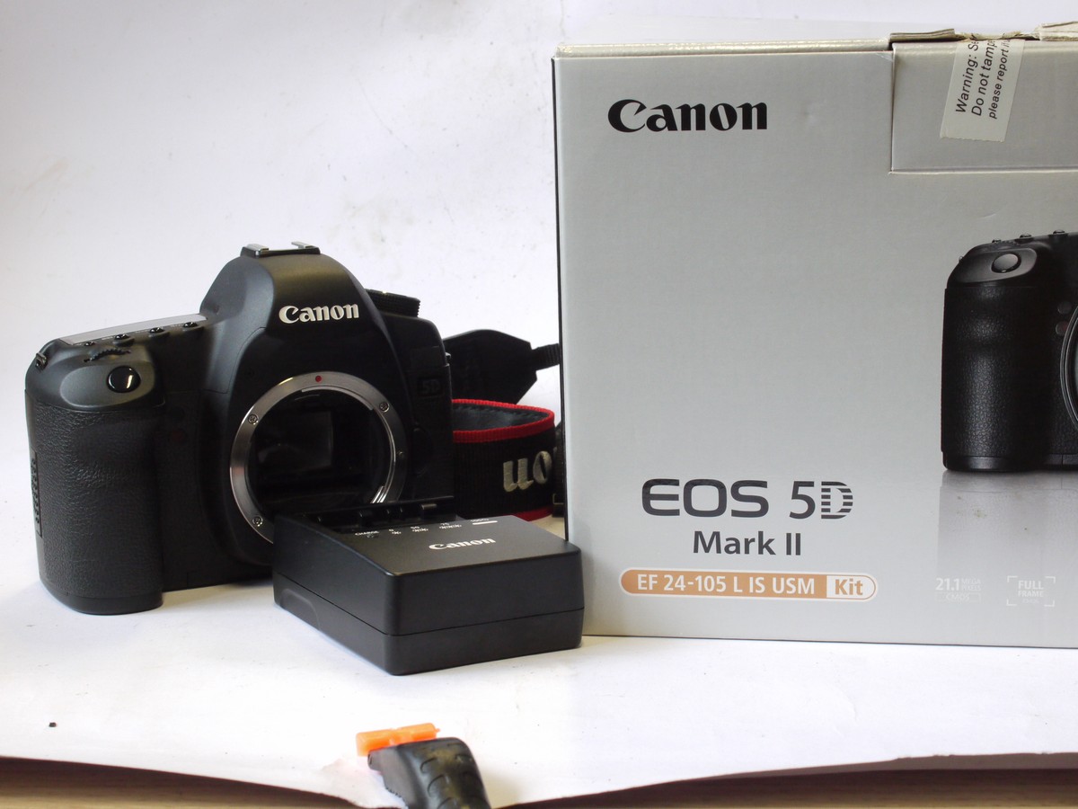 mwclassiccameras-20240816-188 Canon EOS 5D Mark II Digital SLR body, with Canon Battery, Canon LC-E6E Charger, Canon neck strap & makers Box. VERY LOW SHUTTER COUNT, below 5000