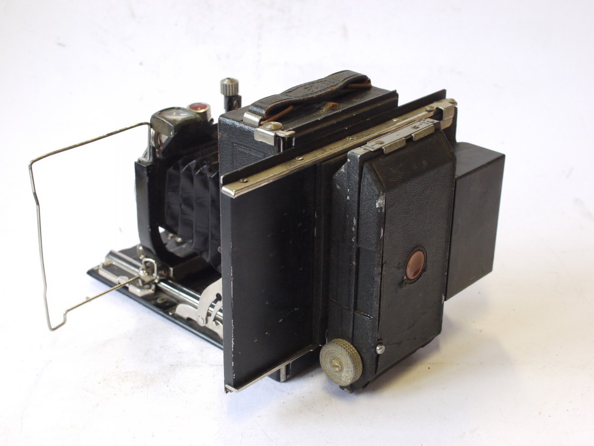 mwclassiccameras-20240816-2 Kodak 6x9 folding plate camera (made by Nagel) + 35mm film back with built-in Miniature Kodachrome Adapter on a large rear panel. (Panel moves sideways for focusing on ground glass. With 105mm f4.5 Anastigmat lens in Compur shutter. UNCOMMON BACK