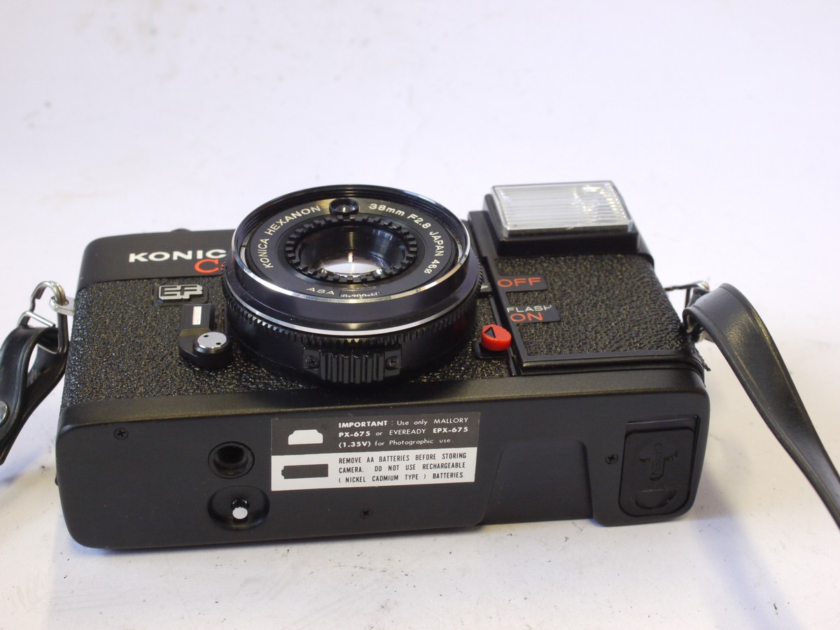 mwclassiccameras-20240823-104 Konica C35 EF 35mm Zone-Focus camera with 38mm f2.8 Hexanon lens + front cap & Neck Strap. Takes AA Batteries