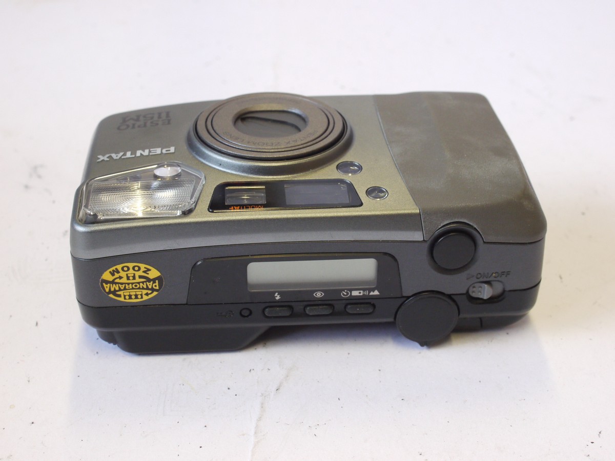 mwclassiccameras-20240823-126 Pentax Espio 115M 35mm Compact Autofocus camera, Panorama Zoom feature, Grey coloured, with 38-115mm Pentax Zoom lens + Pentx case