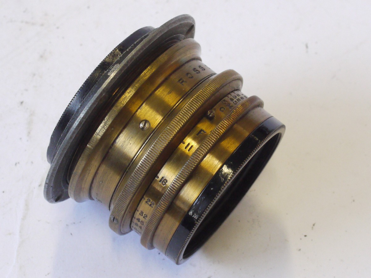 mwclassiccameras-20240823-17 Ross London Combinable Brass lens "S.R.E No. J2786" with Iris Diaphragm & flange. Consists of 9 1/2 inch f11 & 10 1/4 inch f11 lenses. With leather case