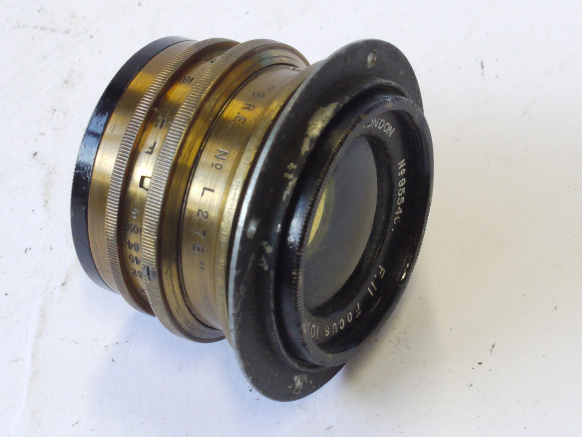 mwclassiccameras-20240823-18 Ross London Combinable Brass lens "S.R.E No. J2786" with Iris Diaphragm & flange. Consists of 9 1/2 inch f11 & 10 1/4 inch f11 lenses. With leather case