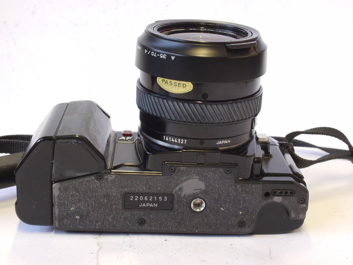 mwclassiccameras-20240830-18 Minolta 7000 35mm Autofocus SLR + Minolta 35-70mm f4 AF Zoom, Minolta bayonet lens hood, Neck strap & ER case