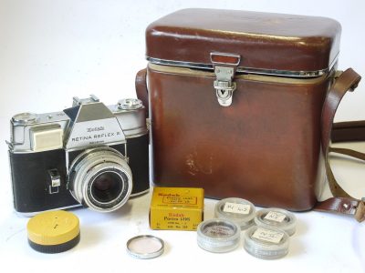 Kodak Retina Reflex III 35mm Selenium metered SLR + Schneider 50mm f2.8 Retina-Xenar Deckel mount lens with meter diffuser cover, 7 x filter Set (OL Skylight, R:1:2, R:1:4.5, NI & NII close-Ups, Portra 1 & Portra 2 Close-ups), Data Guide Booklet & Kodak leather outfit case