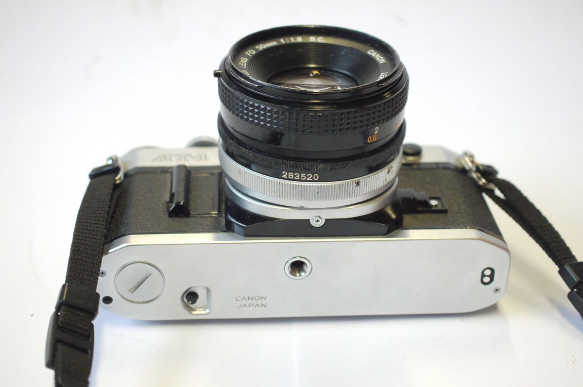 mwclassiccameras-20240906-149 Canon AT-1 35mm SLR, chrome + Canon 50mm f1.8 FD Breechlock mount lens, front cap & neck strap