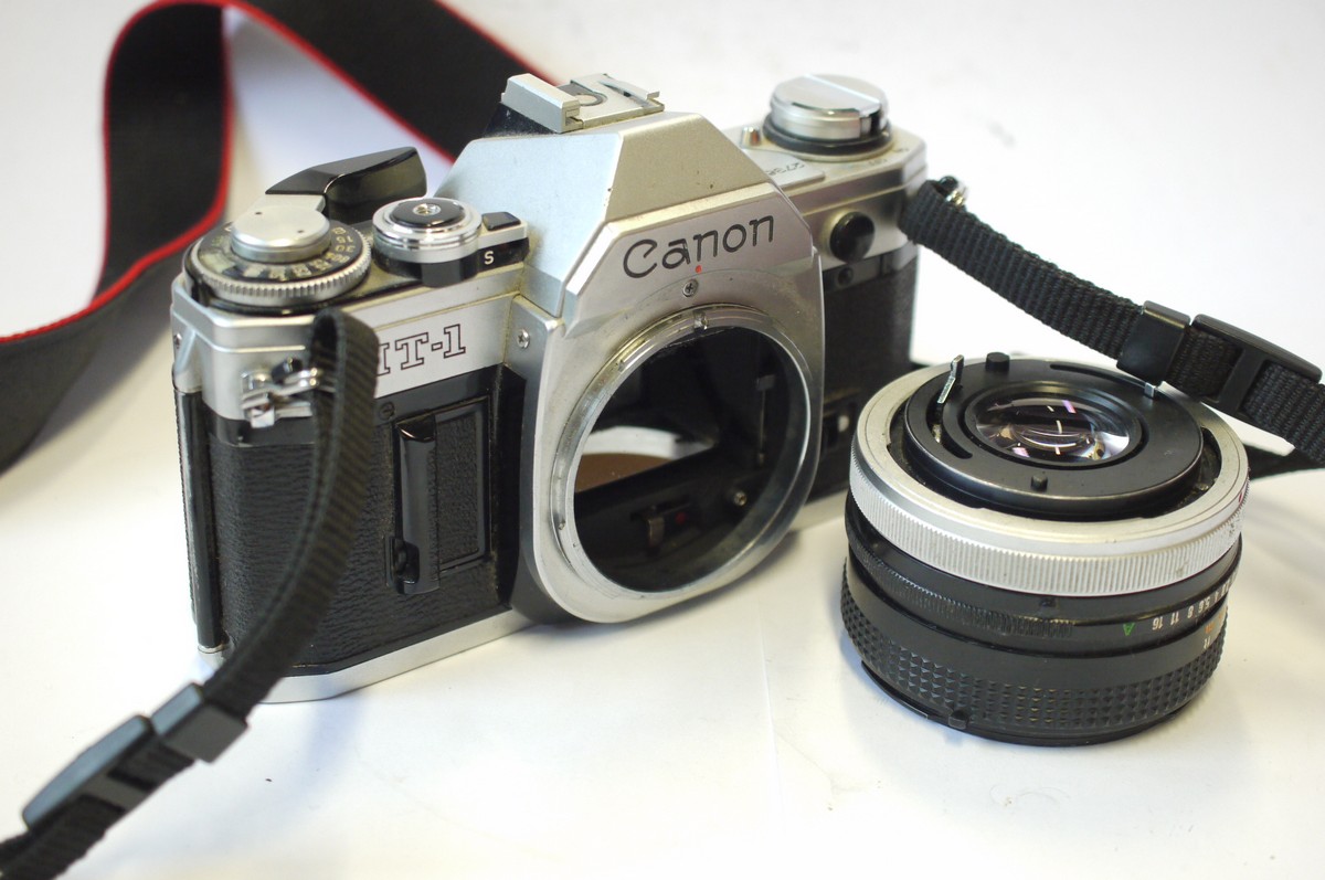 mwclassiccameras-20240906-150 Canon AT-1 35mm SLR, chrome + Canon 50mm f1.8 FD Breechlock mount lens, front cap & neck strap